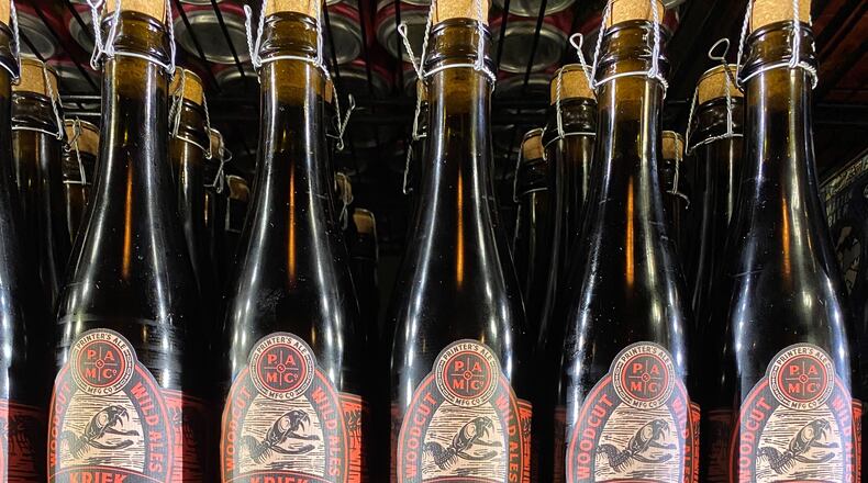 Printer’s Ale Kriek is spontaneously fermented, transferred into wine barrels, and aged on cherries for over a year before bottling. (Bob Townsend for The Atlanta Journal Constitution)