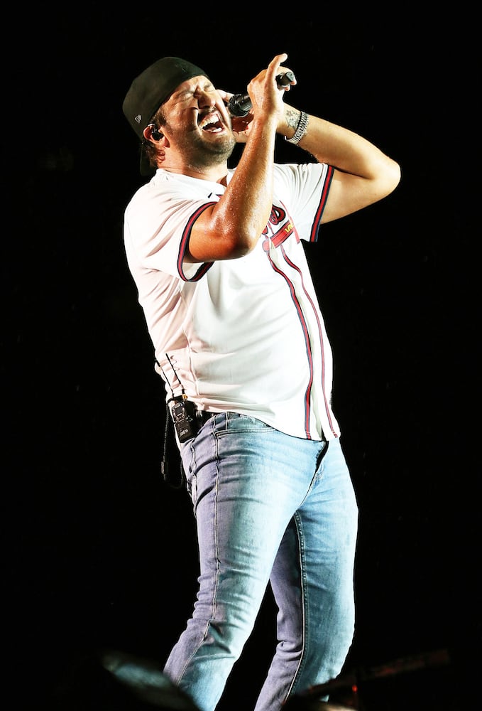 Luke Bryan rocked rainy and sold out Truist Park on Saturday, August 17, 2024 on his Mind of a Country Boy Tour. His support acts were Bailey Zimmerman, Kameron Marlowe and American Idol winner Chayce Beckham. 
Robb Cohen for the Atlanta Journal-Constitution