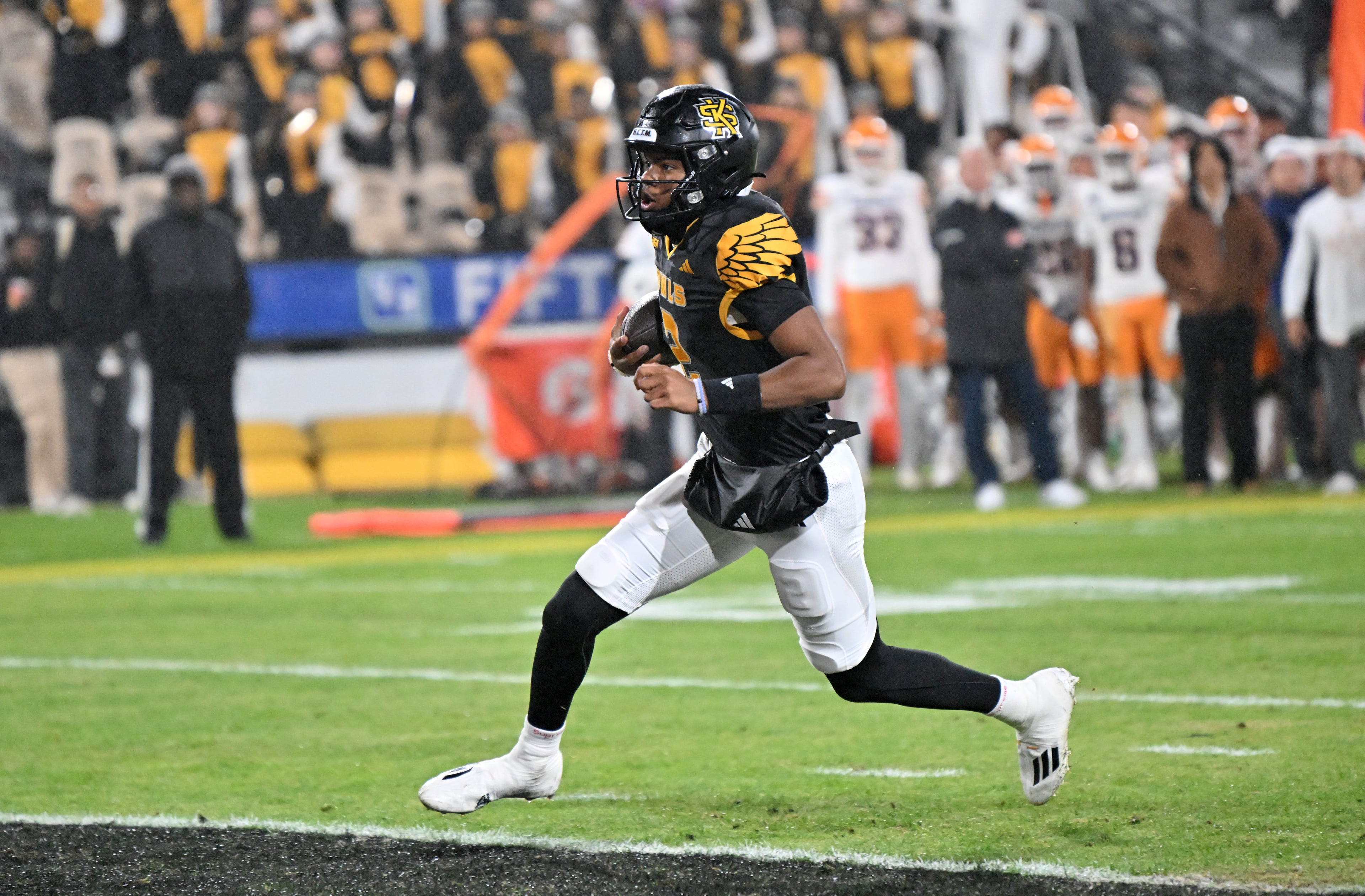 Kennesaw State quarterback Amari Odom (2) runs for a touchdown during the second half in an NCAA college football game at Fifth Third Stadium, Tuesday, October 28, 2025 in Kennesaw. Kennesaw State won 33-20 over University of Texas at El Paso. (Hyosub Shin / AJC)