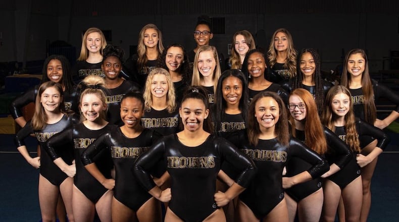 The 2021 Carrollton Trojans gymnastics team, front to back row, from left to right: Gabbie Willingham, Thalia Bray, Abby Henry, Reagan Bearden, Mallory Pittman, Kendall New, Anna Claire Sides, Emoni Jones, Eliana Newsome, Sariayah Suluki, Shania Risper, Kaleigh McEwen, Briley Sims, Ashley Holston, Kalani Witherspoon, Erin Entrekin, Taylor Anne Tucker, Bella Moore, Miracle Cox, Abigail Pike, Bailey Moore.