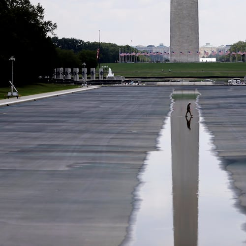 The Washington Monument is seen in the background of the now drained Lincoln Memorial Reflecting Pool, Wednesday, July 29, 2026, in Washington. (AP Photo/Rahmat Gul)
