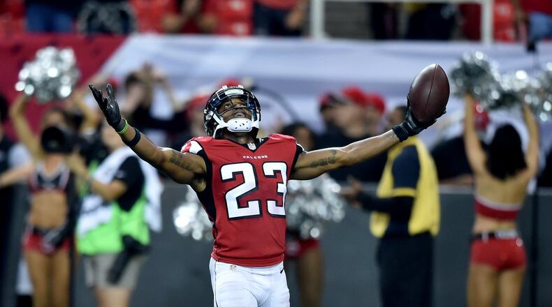October 2, 2016 Atlanta: Atlanta Falcons cornerback Robert Alford reacts after making his second interception in the 4th quarter against the Carolina Panthers in the Georgia Dome Sunday October 2, 2016. BRANT SANDERLIN/BSANDERLIN@AJC.COM