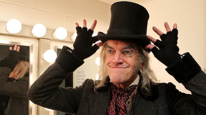 Chris Kayser, who plays Scrooge at the Alliance Theatre, prepares for the part in his small dressing room below the stage in 2010. Curtis Compton ccompton@ajc.com