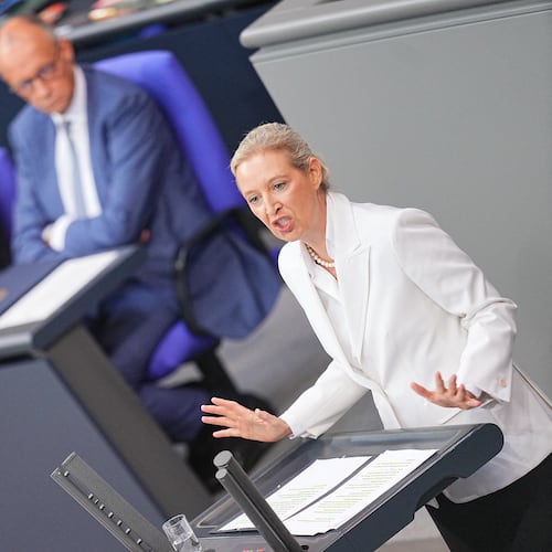 Federal chairwoman and parliamentary group leader of the AfD Alice Weidel opens the general debate as part of the budget deliberations in the Bundestag, with German Chancellor Friedrich Merz sitting on the background, in Berlin, Wednesday Sept. 9, 2026 (Michael Kappeler/dpa via AP)