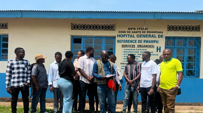 Workers at an Ebola treatment center go on strike over unpaid salaries and bonuses at Rwampara General Hospital, in Ituri, northeastern Congo, Monday, July 13, 2026, (AP Photo/Prosper Heri Ngorora)