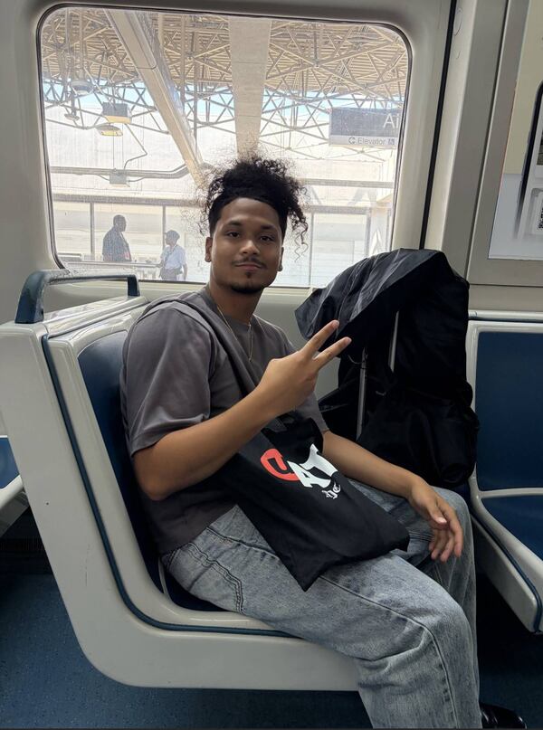 Elijah Megginson, a 2026 AJC intern, rides the MARTA gold line train to downtown Atlanta on Aug. 12, 2026.