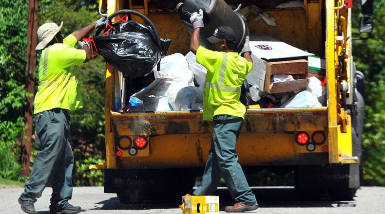 Clayton County continues public meeetings about mandatory curbside garbage collection. AJC file photo