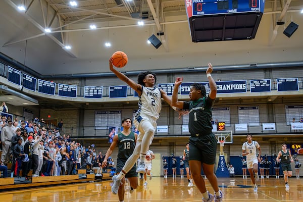 Pace Academy's Eric Chatfield Jr. drives  to the basket in a December game against Westminster.