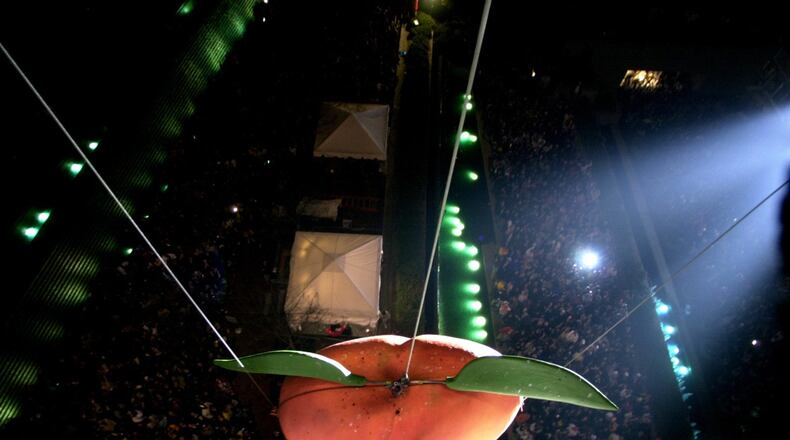 On New Year's Eve Atlanta's familiar 800-pound Peach will drop into Underground Atlanta