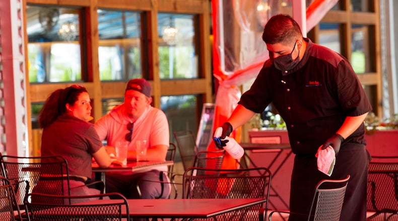 While hospitality was hit very hard by pandemic-triggered shutdowns and changes in consumer behavior, the sector has been rapidly adding jobs. In Georgia last month, the sector was among those leading the hiring. (Juan Figueroa/The Dallas Morning News/TNS)