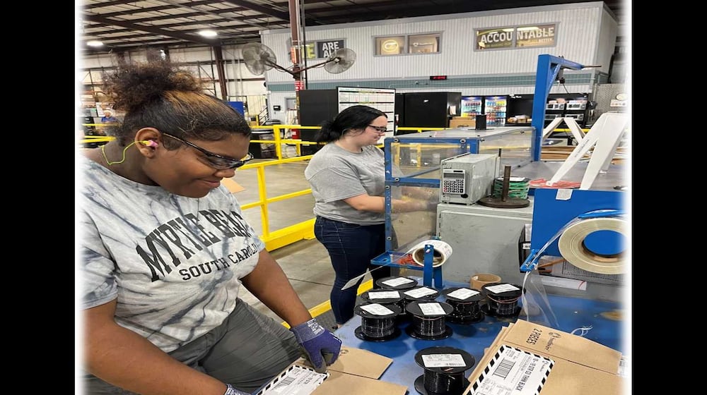 Two students in the Southwire 12 for Life program work on a project. 12 For Life was created by Southwire executives concerned about the then-high dropout rate at Carroll County High School and the impact it was having on the company's ability to hire employees. (Courtesy photo)