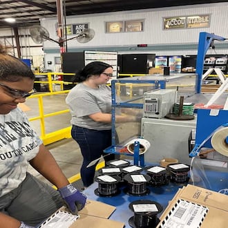 Two students in the Southwire 12 for Life program work on a project. 12 For Life was created by Southwire executives concerned about the then-high dropout rate at Carroll County High School and the impact it was having on the company's ability to hire employees. (Courtesy photo)
