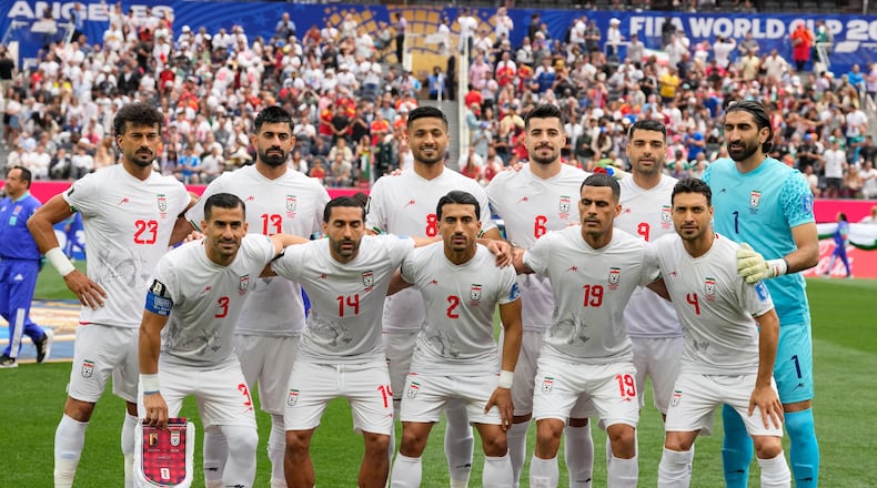Iran team pose for a group photo prior to the World Cup Group G soccer match between Belgium and Iran in Inglewood, Calif., near Los Angeles, Sunday, June 21, 2026. (AP Photo/Andre Penner)