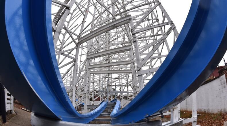 New steel track (blue) has been installed onto the former Georgia Cyclone for the new Twisted Cyclone ride that’s expected to open in May 2018 at Six Flags Over Georgia. HYOSUB SHIN / HSHIN@AJC.COM