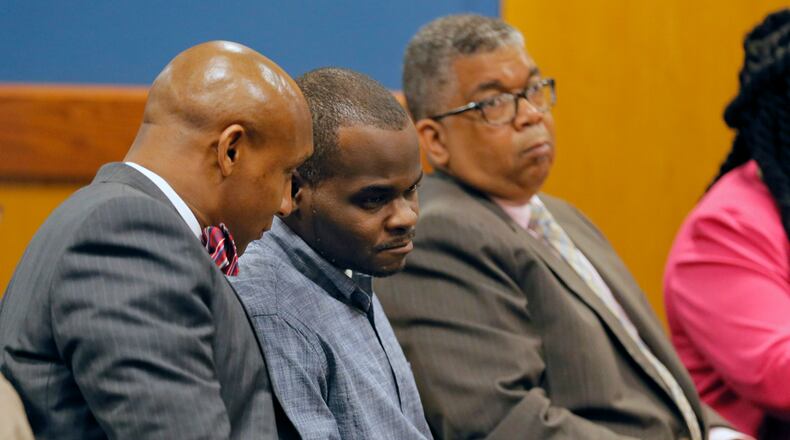 April 18, 2017 - Atlanta - Basil Eleby speaks with Mawuli Davis, one of Elebyâs four attorneys. Elegy, the homeless man accused of setting the fire that brought down a chunk of Interstate 85, is expected to be released on bond after pleading not guilty to arson and criminal trespass charges in court Tuesday morning. BOB ANDRES /BANDRES@AJC.COM