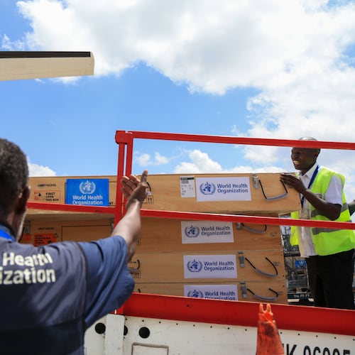 Workers load World Health Organization (WHO) emergency supplies onto a United Nations plane in Nairobi, Kenya, Wednesday, May 20, 2026, headed for Congo to combat the Ebola outbreak in Ituri province. (AP Photo/Andrew Kasuku)