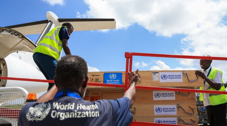 Workers load World Health Organization (WHO) emergency supplies onto a United Nations plane in Nairobi, Kenya, Wednesday, May 20, 2026, headed for Congo to combat the Ebola outbreak in Ituri province. (AP Photo/Andrew Kasuku)