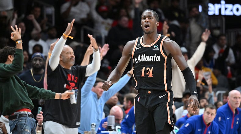 November 10, 2022 Atlanta - Atlanta Hawks' forward AJ Griffin (14) celebrates after scoring during the second half in an NBA basketball game at State Farm Arena on Thursday, November 10, 2022. Atlanta Hawks won 104-95 over Philadelphia 76ers. (Hyosub Shin / Hyosub.Shin@ajc.com)