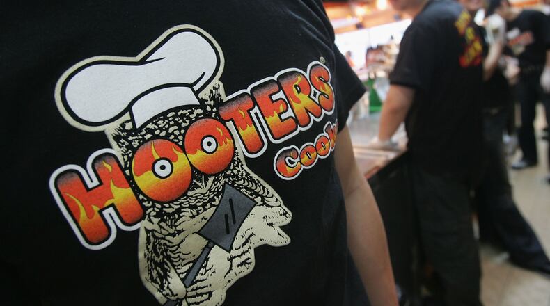SEOUL, SOUTH KOREA - JANUARY 12: South Korean employees undergo training at Hooters restaurant on January 12, 2007 in Seoul, South Korea. (Photo by Chung Sung-Jun/Getty Images)