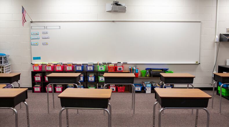 Desks are seen socially distanced in Northbrook Middle School in Suwanee, Georgia, on Wednesday, July 8, 2020. With about a month left before Georgia schools begin the new school year, districts are annoucing plans for how that new year will look. Northbrook Middle School is amping up their cleaning and disinfecting practices, creating social distancing protocols and posting signage to help reduce the risk of students spreading Covid-19.