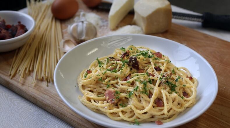 Spaghetti alla carbonara comes together quickly, but it can be tricky, calling for a certain technique -- and the right ingredients. (Jessica J. Trevino/Detroit Free Press/TNS)