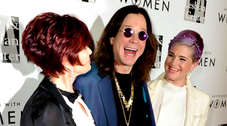 Kelly Osbourne with her parents in 2013 in Beverly Hills, Calif. Photo: Kevin Winter/Getty Images