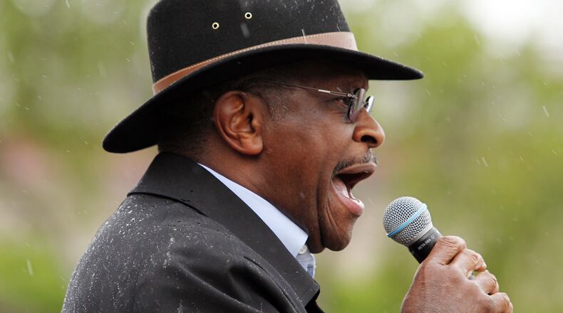 Former Republican presidential candidate Herman Cain speaks during the annual Tax Cut Rally, sponsored by the Taxpayers League of Minnesota, at the Minnesota State Capitol, Saturday, April 28, 2012, in St. Paul, Minn.