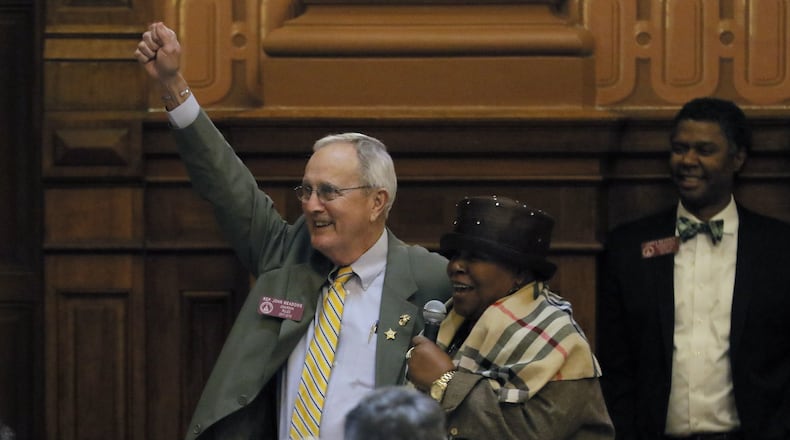 House Rules Chairman John Meadows, left, raises his hand on the 39th day of the 40-day legislative session in March 2017. Meadows, who was first elected to the state House in 2004, died Tuesday morning at age 74. BOB ANDRES /BANDRES@AJC.COM