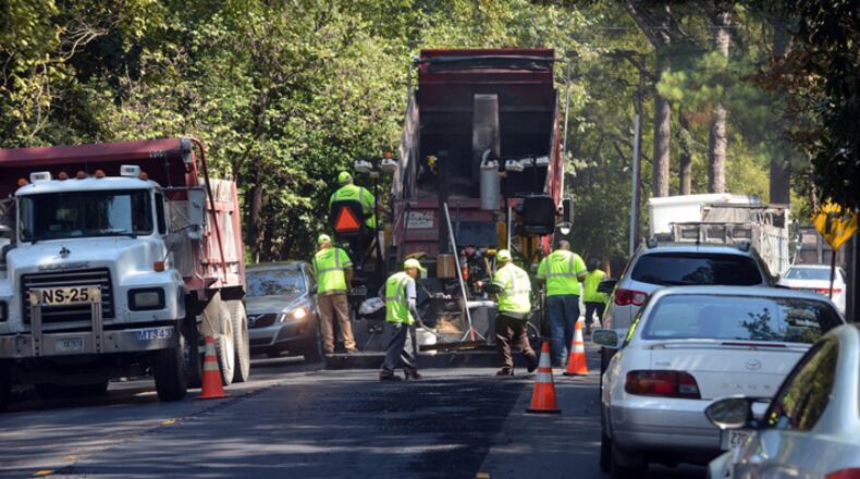 Cobb commissioners have awarded a $9.2 million contract to Baldwin Paving Company Inc. to resurface nearly 22 miles of 23 roads by April 30, 2020. AJC file photo