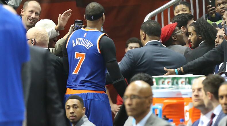 Knicks forward Carmelo Anthony leaves the court after he was charged a flagrant foul 2 against Hawks guard Thabo Sefolosha and ejected from the NBA basketball game on Wednesday, Dec. 28, 2016, in Atlanta. Curtis Compton/ccompton@ajc.com