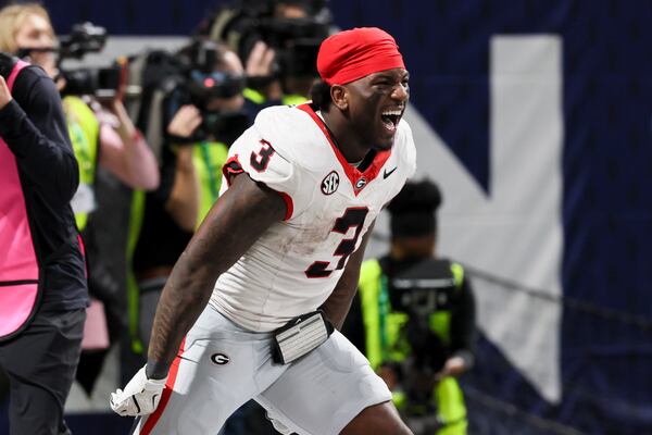 Bulldogs running back Nate Frazier celebrates their win 28-7 win against Alabama during the SEC championship game at Mercedes-Benz Stadium on Saturday, Dec. 6, 2025, in Atlanta. (Jason Getz/AJC)