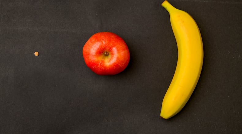 A lentil shows about how big a human embryo is when measured at six weeks of pregnancy. At 15 weeks, the fetus is about the size of an apple, and at 20, about the size of a banana. Pregnancy apps often use fruit to show the size of human development at different stages of pregnancy. (PHOTO by Hyosub Shin / Hyosub.Shin@ajc.com)