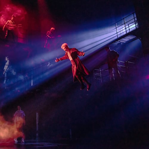 L.J. Benet, foreground left, and Ali Louis Bourzgui, suspended right, appear with the Broadway cast of "The Lost Boys" during a performance in New York on March 25, 2026. (Matthew Murphy via AP)