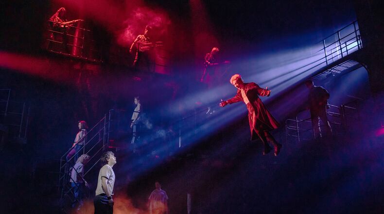 L.J. Benet, foreground left, and Ali Louis Bourzgui, suspended right, appear with the Broadway cast of "The Lost Boys" during a performance in New York on March 25, 2026. (Matthew Murphy via AP)