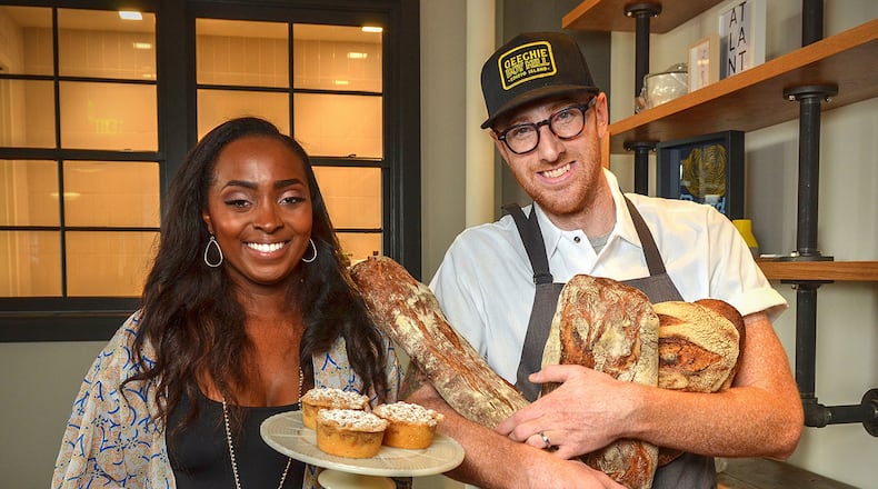 Nicole and Chris Wilkins hold some of the products that will be offered at Root Baking Company.