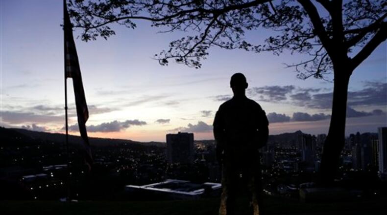 The remains of Army soldier Luther Story, killed in action during the Korean War, were interred at the Punchbowl National Memorial Cemetery of the Pacific in Honolulu and recently identified. (AP Photo/Gerald Herbert)