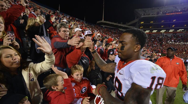 Georgia Bulldogs safety Bacarri Rambo, seen in this Nov. 10, 2012, photo as he celebrated with fans after defeating Auburn and sealing the SEC East title at Jordan-Hare Stadium, was granted bond Monday.