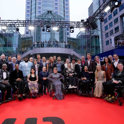 Cast and crew arrive on the red carpet to promote the film Being Heumann at the Toronto International Film Festival, in Toronto, Thursday, Sept. 10, 2026. (Chris Young/The Canadian Press via AP)