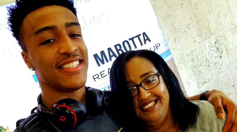 John Collins and his mother, Lyria, who recognized her son’s basketball talent at a young age. (Contributed photo to Palm Beach Post)