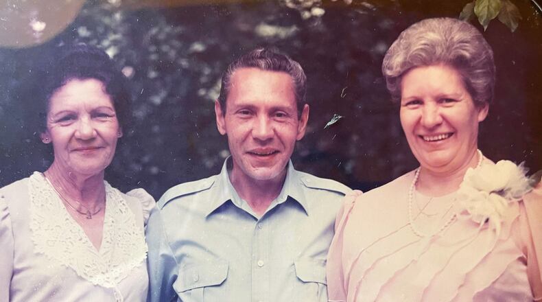 Herman Wilder with his sisters Clara Odom (left) and Rene Wright in an undated family photo. He was brutally killed in 2001, in a mystery that took 24 years to solve. (Courtesy)