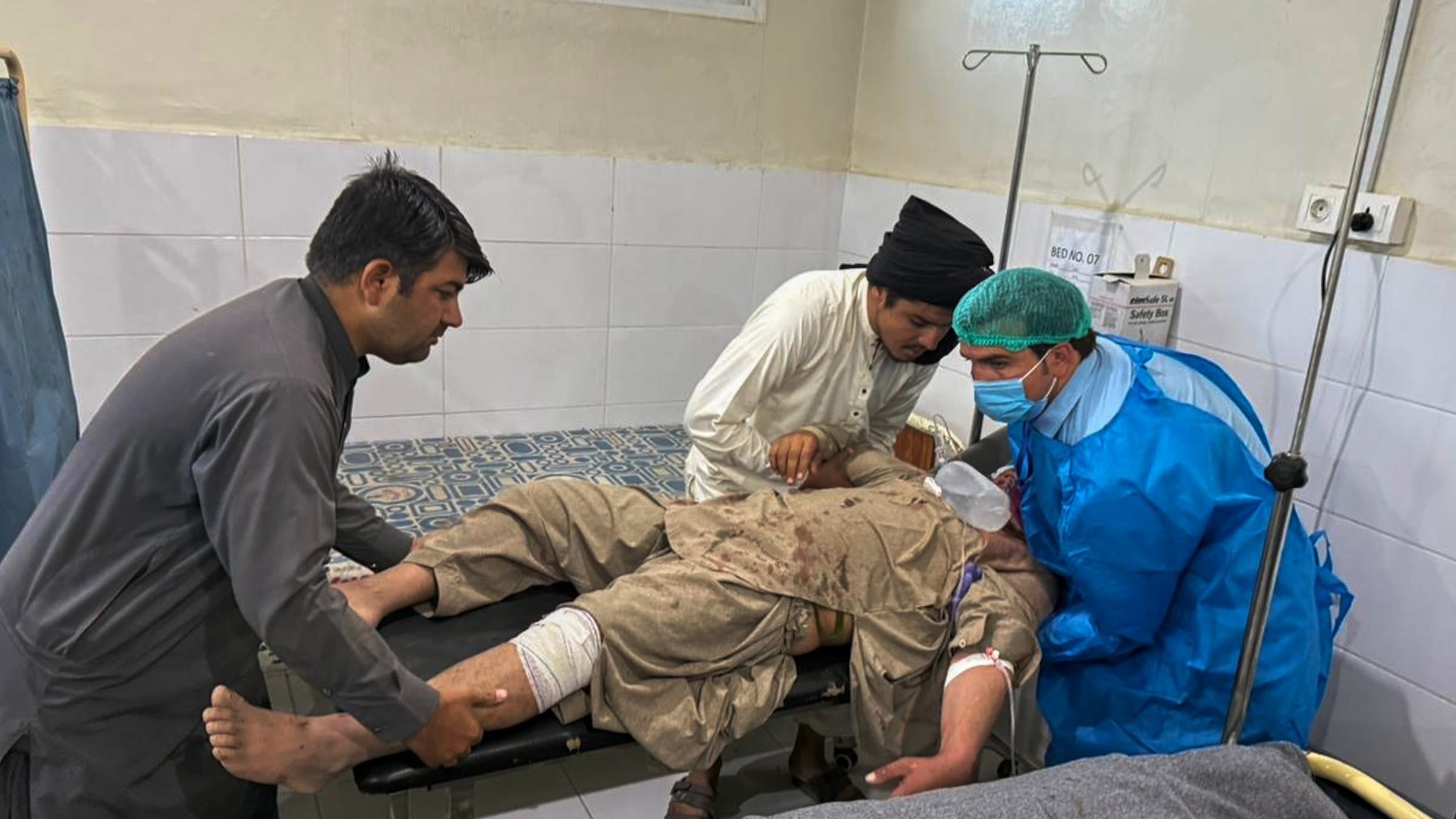 A man, who was injured in the clashes between Pakistan and Afghan forces in border area, receives medical treatment at a hospital in Chaman, a town on the Pakistan side of the Afghanistan border, Wednesday, Oct. 15, 2025. (AP Photo/H. Achakzai)