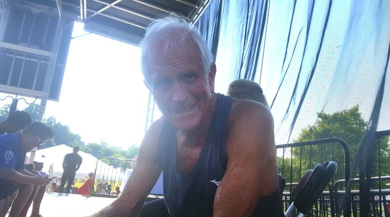 Bill Thorn, a resident of Tyrone, sits on stage after running his 47th Atlanta Journal-Constitution Peachtree Road Race on July 4, 2016. Thorn plans to run in the 2017 version of the Peachtree. (Jaylon Thompson/AJC file photo)