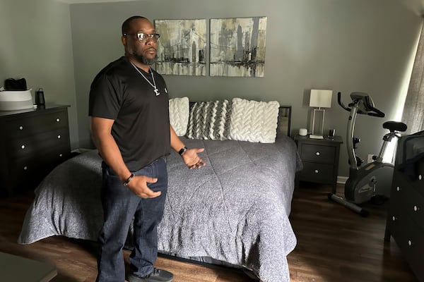 Toi Cliatt talks about the raid in the bedroom where he and then-girlfriend Trina Martin were sleeping when the FBI broke into their home, in Atlanta on Friday, April 25, 2025. (AP Photo/Sudhin Thanawala)