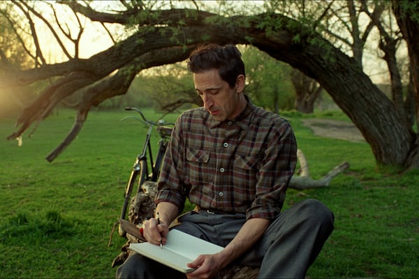 This image released by A24 shows Adrien Brody in a scene from "The Brutalist." (Lol Crawley/A24 via AP)