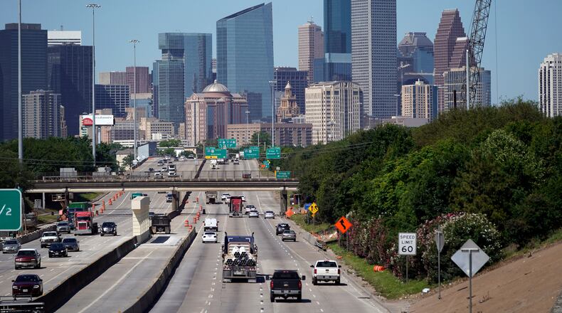 FILE - Traffic moves along Interstate 10 near downtown Houston, April 30, 2020. (AP Photo/David J. Phillip, File)