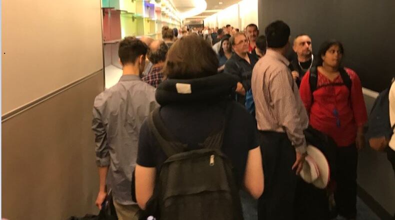 Source: Channel 2 Action News reporter Nefertiti Jáquez via Twitter @NefertitiWSB: People waiting to get through US Customs @ATLairport after their computer system went offline.