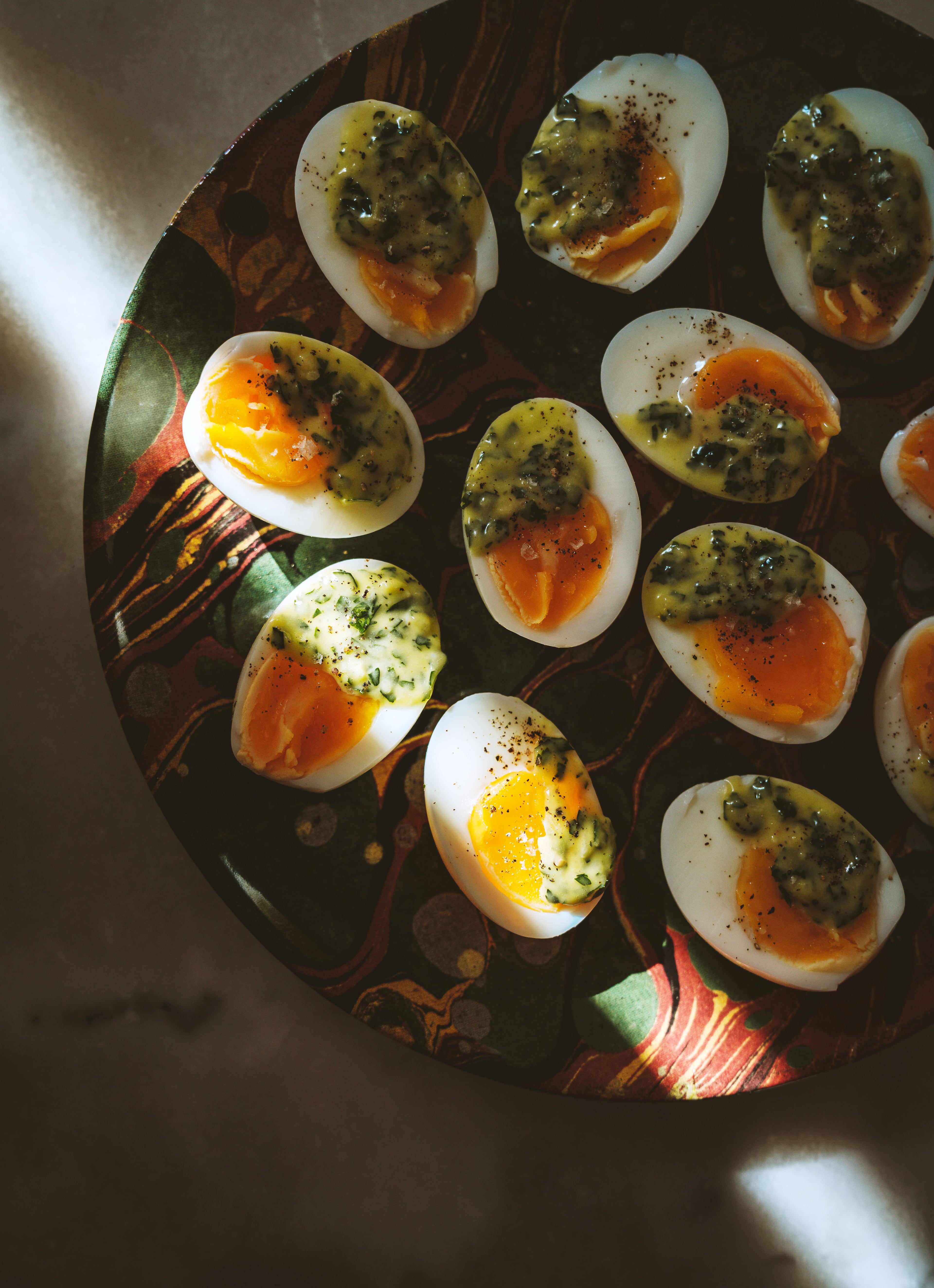 Rebekah Peppler's recipe for Eggs Mayo with Persillade is a delicious, unfussy nibble. (Courtesy of Chronicle Books/Joann Pai)