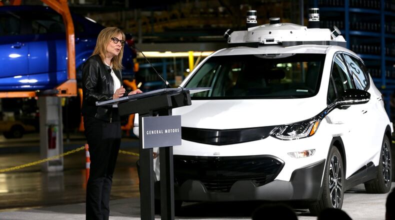 Mary Barra, chairman and CEO of General Motors, talks with workers and members of the media at the Orion Assembly Plant in Orion Township, Mich., on June 13, 2017, announcing that the company has completed production of 130 Chevrolet Bolt EV test vehicles equipped with its next generation of self-driving technology. (Eric Seals/Detroit Free Press/TNS)