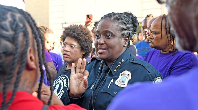 FILE: Chattanooga Police Chief Celeste Murphy talks with family members and friends of Roger Heard Jr., who was killed when three Chattanooga police officers attempted to serve warrants on him on Aug. 11. Friends and family came to the City Council meeting on Aug. 15. Property tax records in Atlanta show Murphy lists a Georgia home as her primary residence. (Photo Courtesy of Robin Rudd)