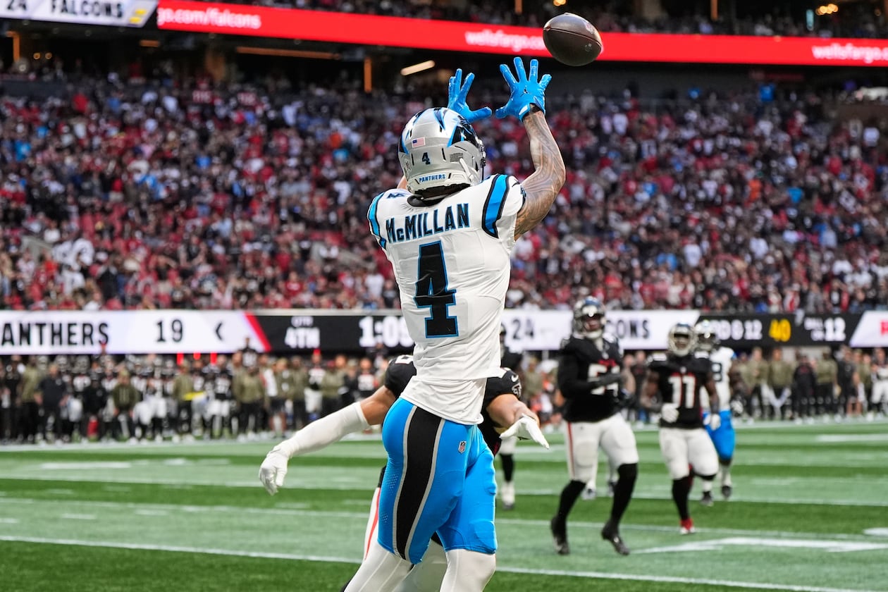 Carolina Panthers wide receiver Tetairoa McMillan (4) pulls in a touchdown pass against the Atlanta Falcons in the second half of an NFL football game, Sunday, Nov. 16, 2025, in Atlanta. (AP Photo/Brynn Anderson)